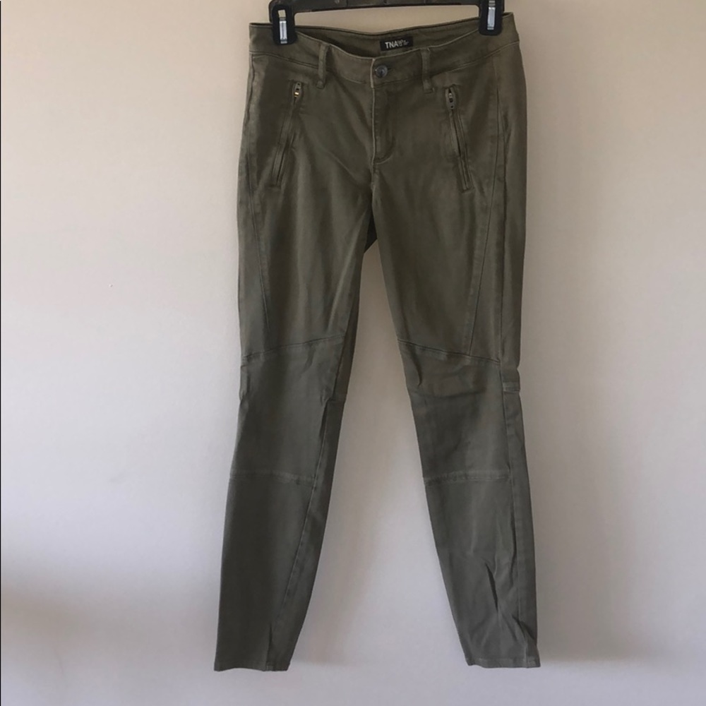 TNA/Aritzia green pants w/ zipper + knee detailing